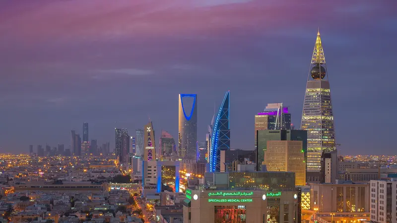 Riyadh skyline at dusk with Kingdom Centre